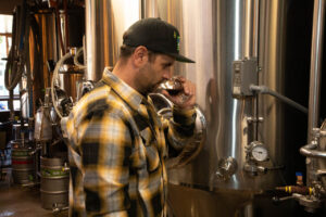 Ryan Sandlin brewing beer