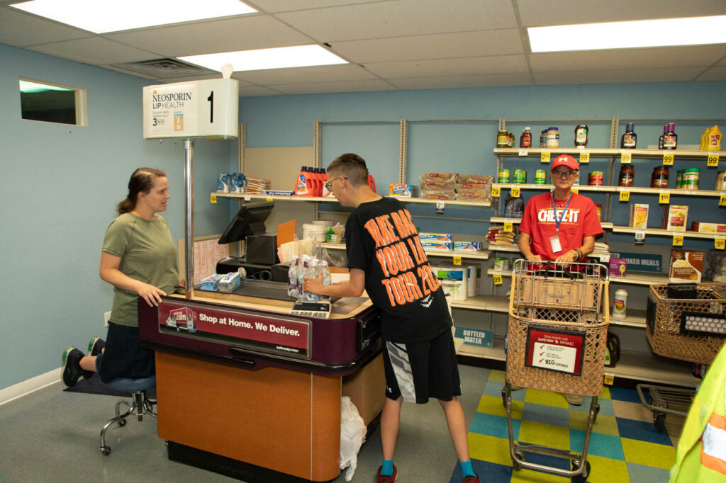 Clients train in grocery work.